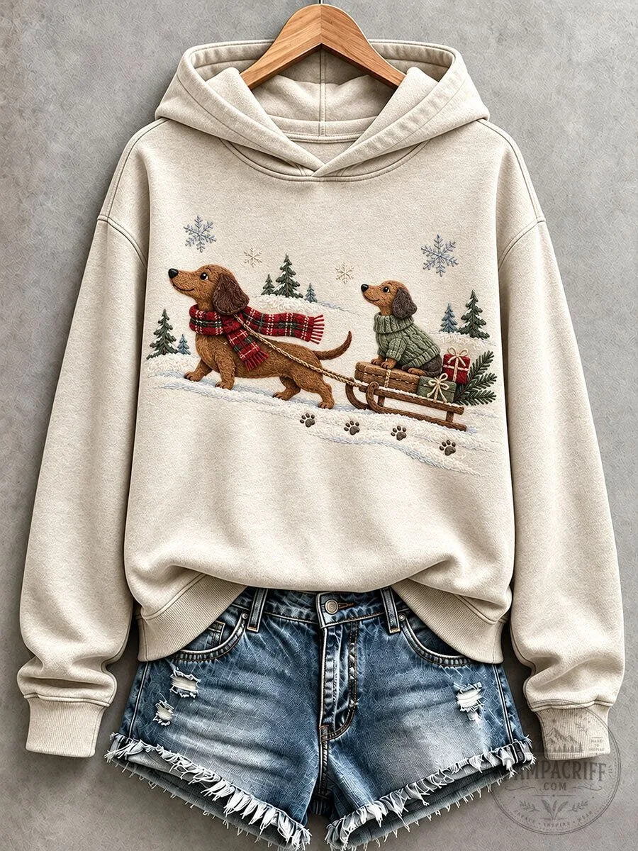 Cute Dachshund Dog Sledding Winter Scene Women's Christmas Hoodie